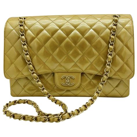 gold hardware chanel bag|Chanel bag with gold ribbon.